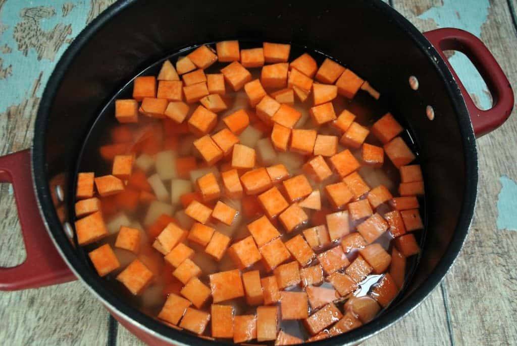 carrots boiling in a pot