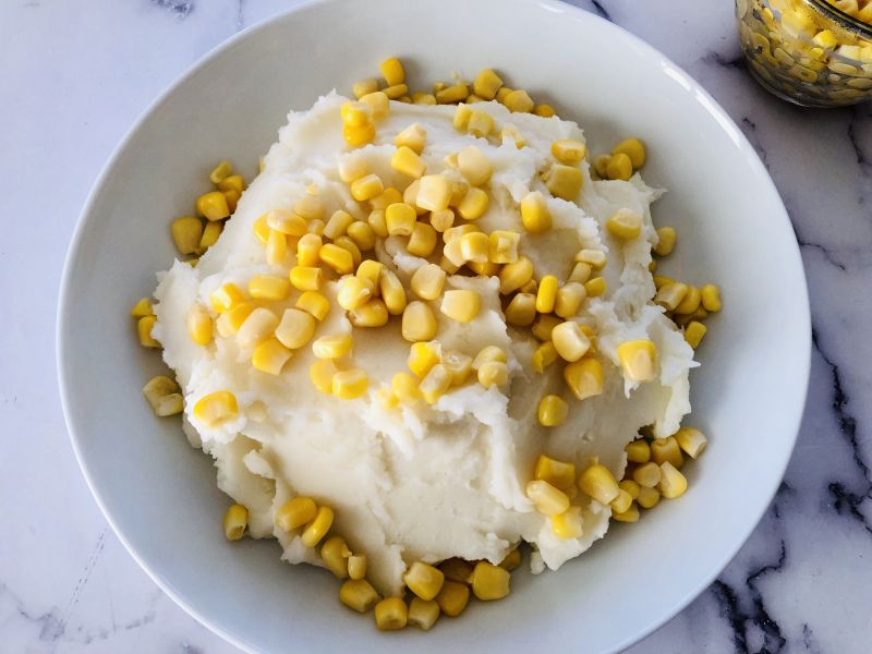 A corn and mashed potato bowl