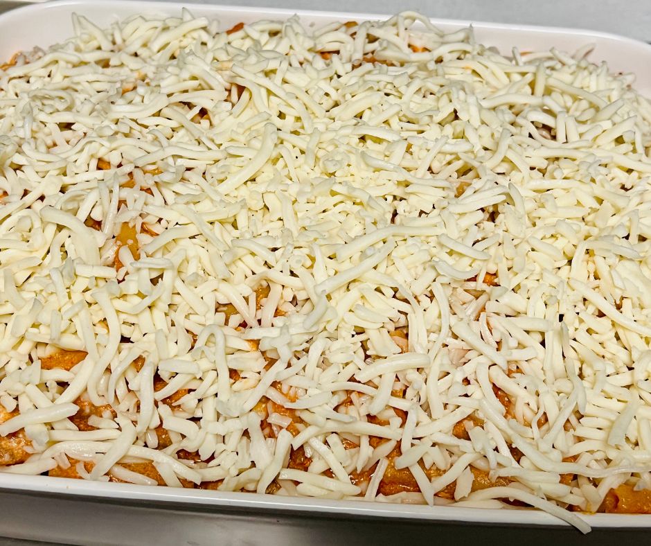 cheese topped pan of Buca di Beppo Baked Ziti