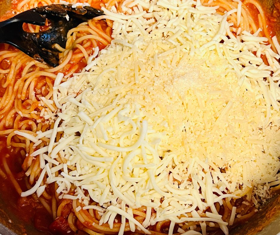 add cheese to spaghetti