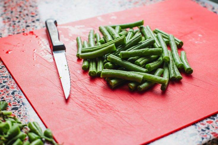 green beans near knife
