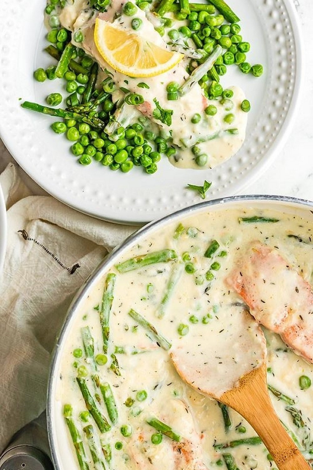 Salmon And Fresh Vegetables With A Creamy White Wine Sauce